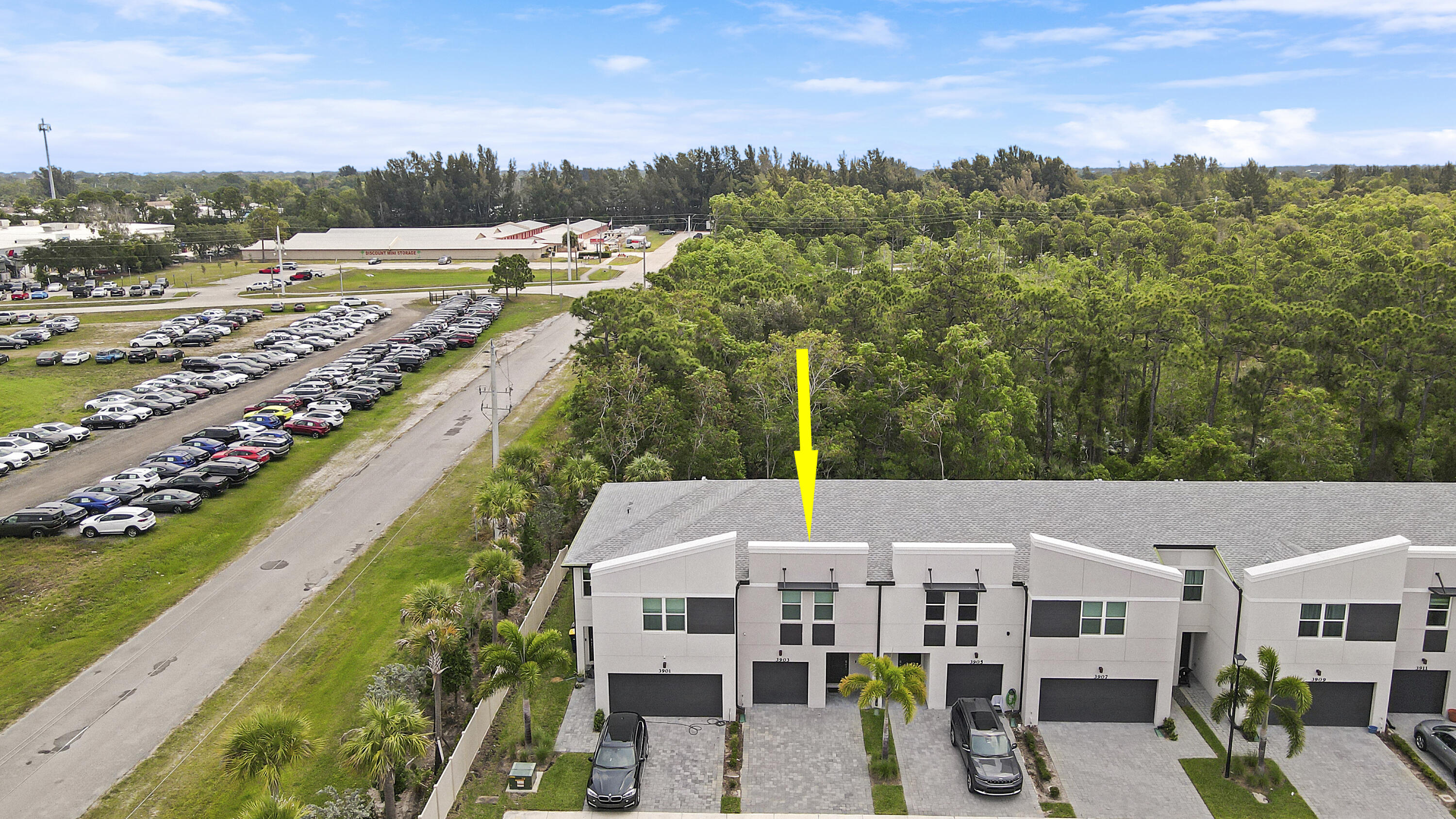 3903 Southeast Mentmore Lane Stuart, FL 34997 - Photo 2 of 35 a view of a city with lawn chairs and large trees