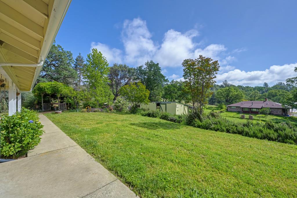 6181 Lambert Lane El Dorado, CA 95623 - Photo 65 of 68 fenced backyard with a shed