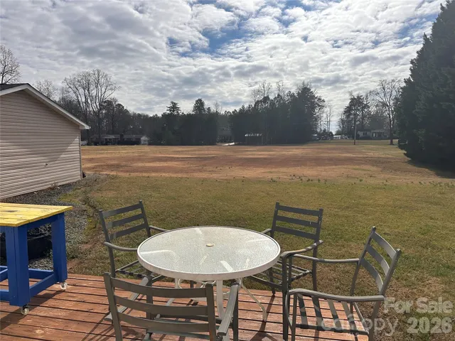 a terrace of a house with outdoor seating