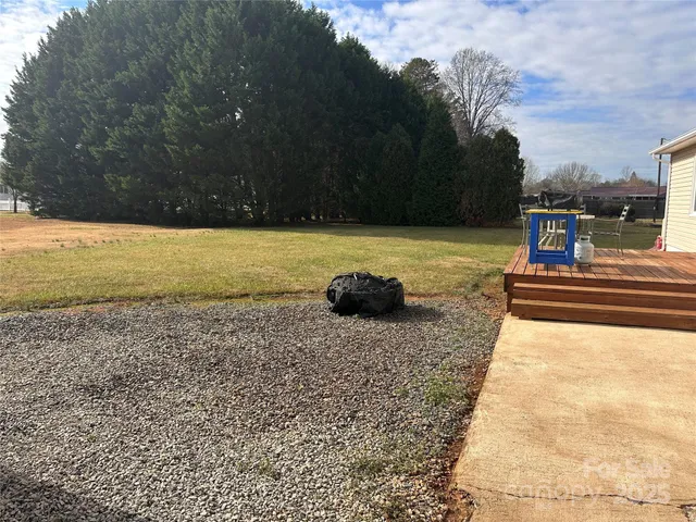 a view of a yard with an outdoor space