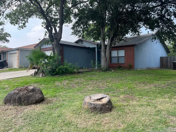 a house view with a garden space