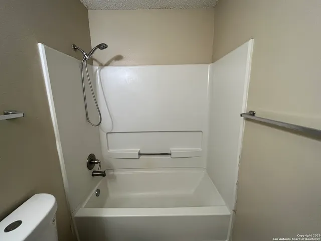a bathroom with a bathtub