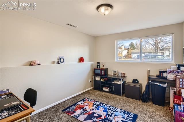 1320 Wooten Road Colorado Springs, CO 80915 - Photo 20 of 26 Bedroom 4