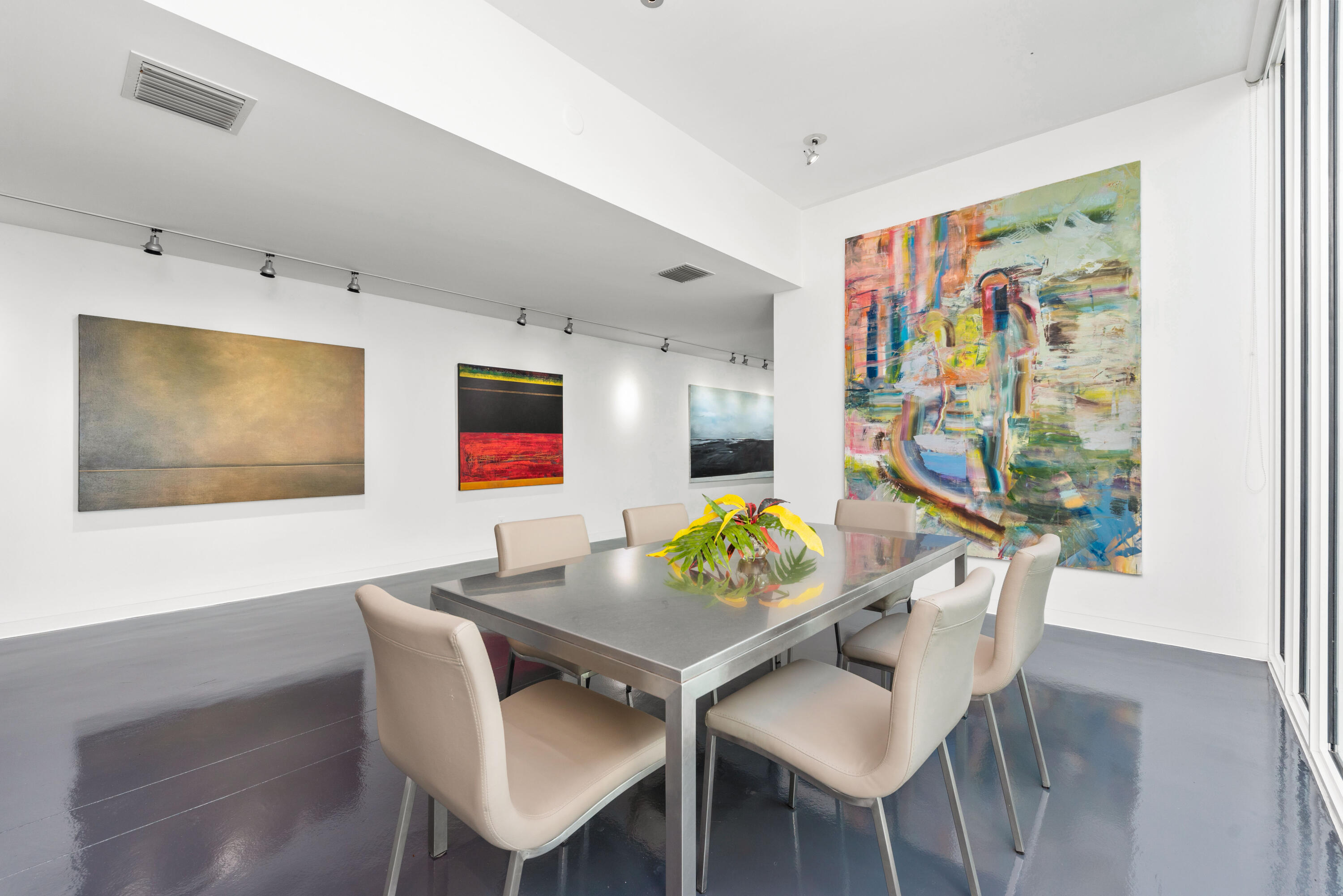 1924 Northwest Shore Terrace Stuart, FL 34994 - Photo 20 of 79 a view of a dining room with furniture and wooden floor