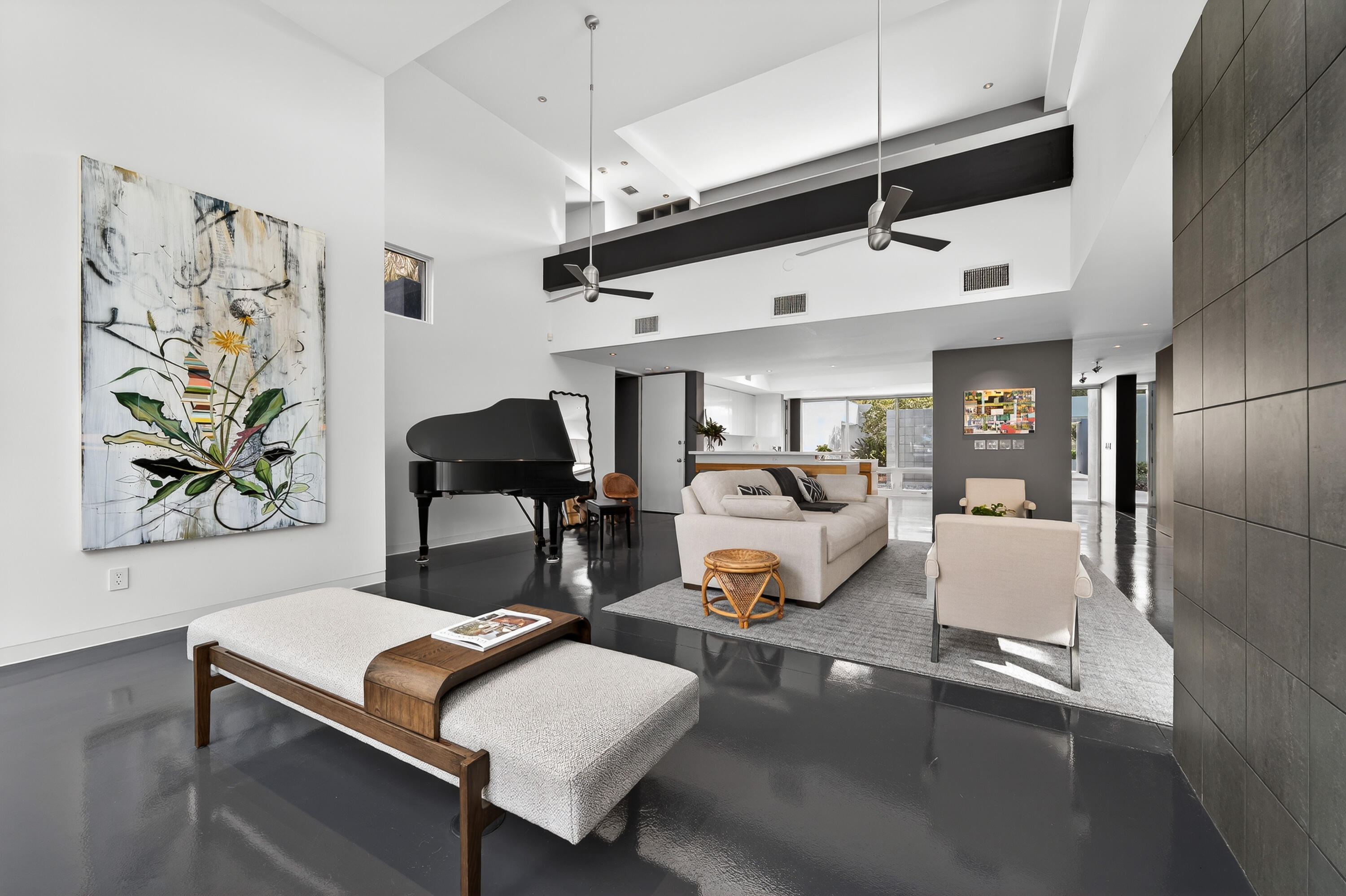 1924 Northwest Shore Terrace Stuart, FL 34994 - Photo 28 of 79 a living room with furniture and a chandelier