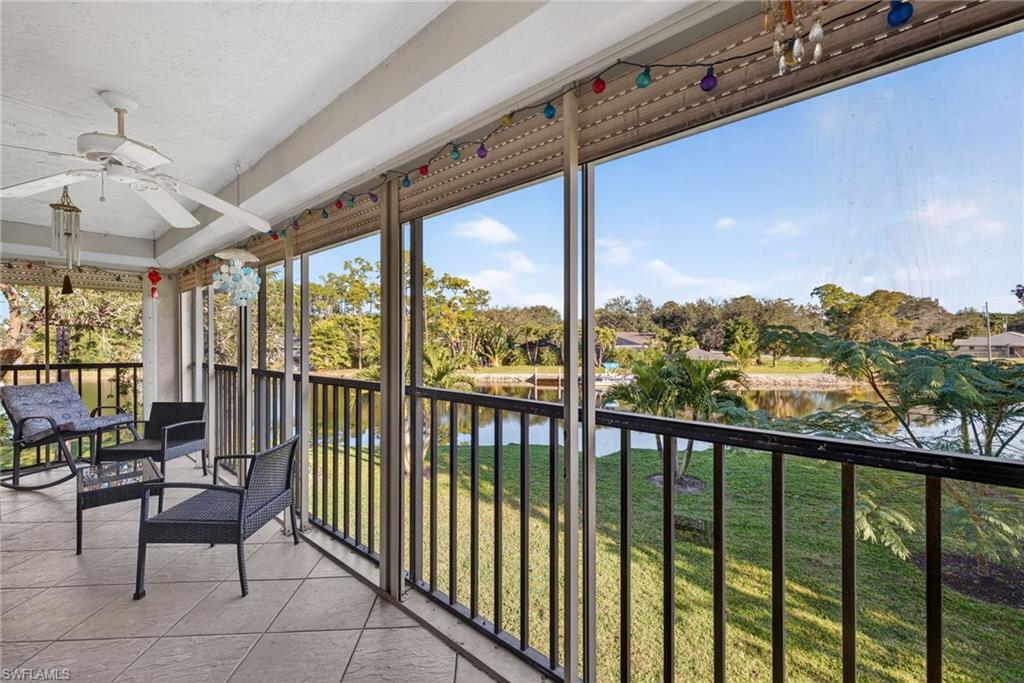1223 Commonwealth Circle, Unit F201 Naples, FL 34116 - Photo 13 of 25 a view of a city from a balcony