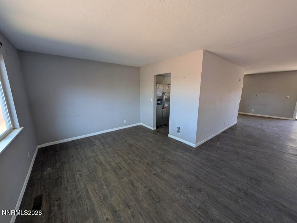 848 C Street Fernley, NV 89408 - Photo 8 of 15 an empty room with wooden floor