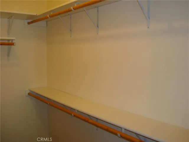 a close up of a wall with rack on the wall