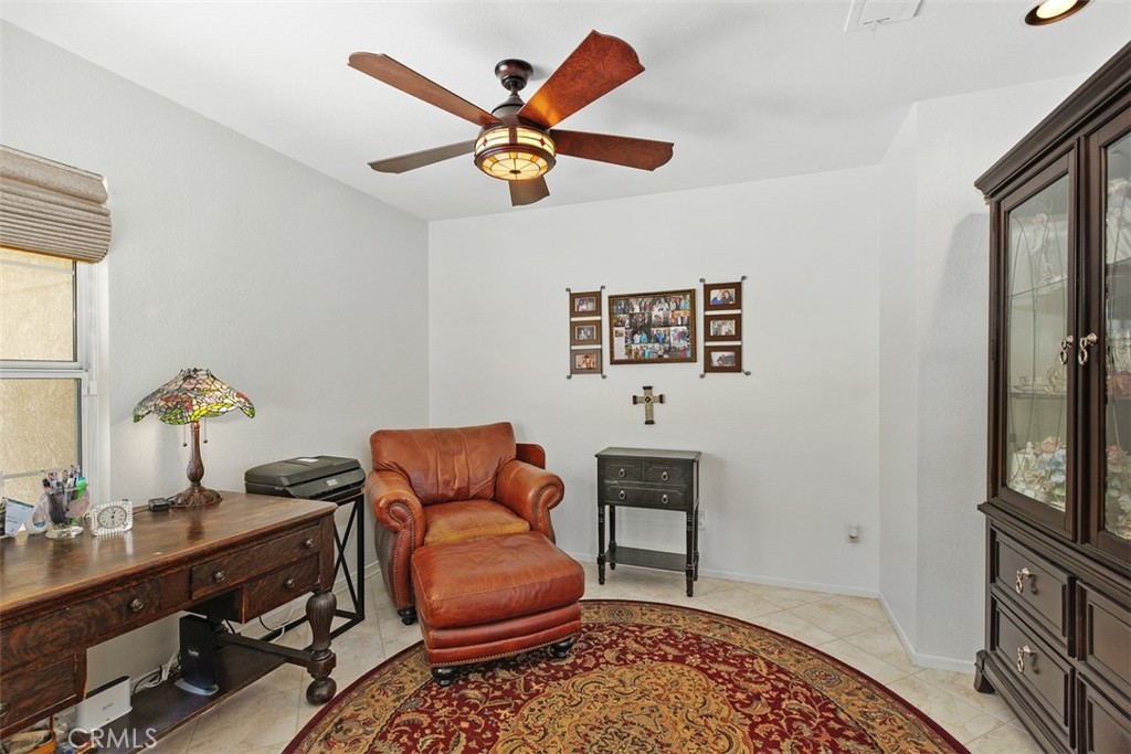 25644 Pelion Road Menifee, CA 92584 - Photo 11 of 26 a work room with furniture and window