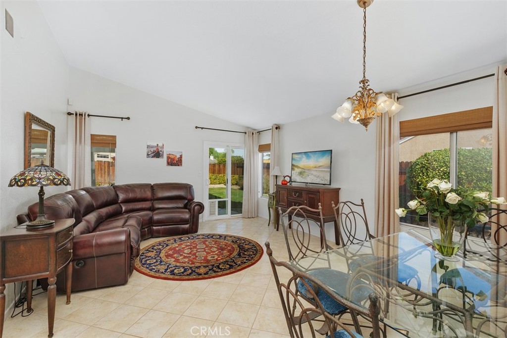 25644 Pelion Road Menifee, CA 92584 - Photo 5 of 26 a living room with furniture and a large window