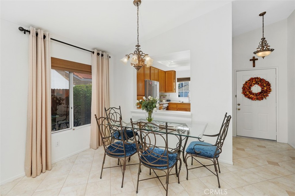 25644 Pelion Road Menifee, CA 92584 - Photo 8 of 26 a dining room with furniture and window