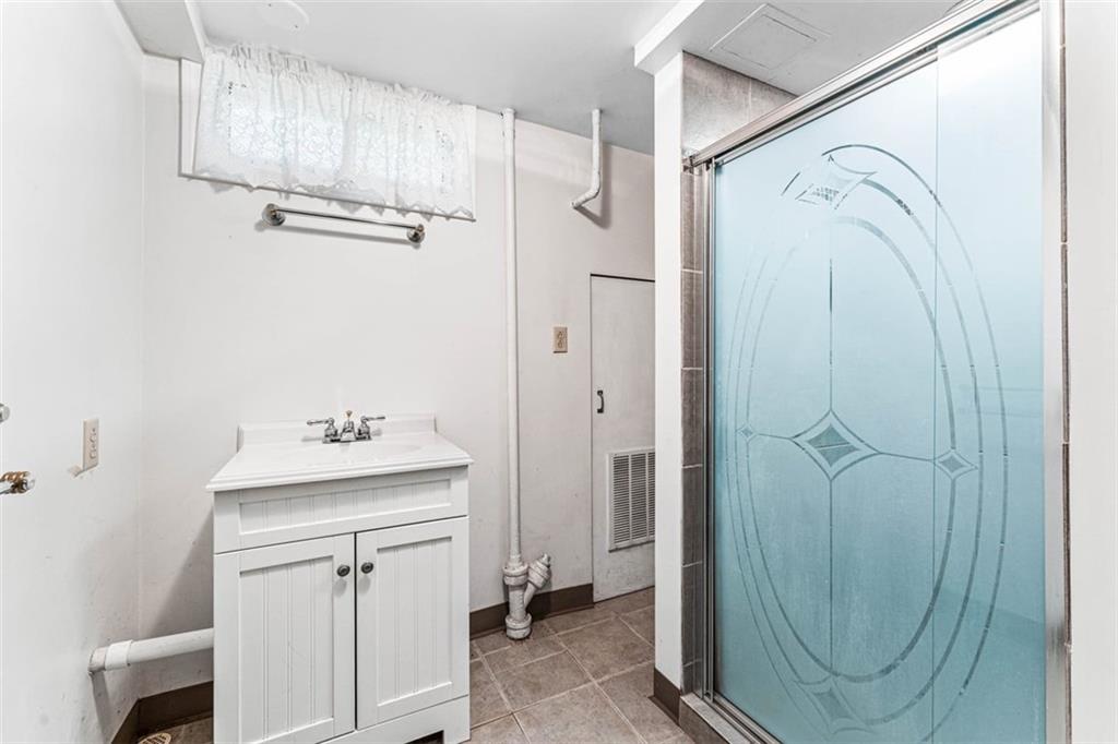3128 New Butler Road New Castle, PA 16101 - Photo 10 of 12 a bathroom with a shower