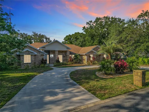 $990,000 | 8707 Fernwicke Court, Orlando, FL 32819