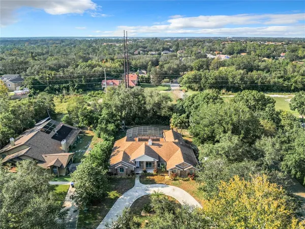 $990,000 | 8707 Fernwicke Court, Orlando, FL 32819