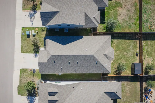 a view of a table and chairs in the patio