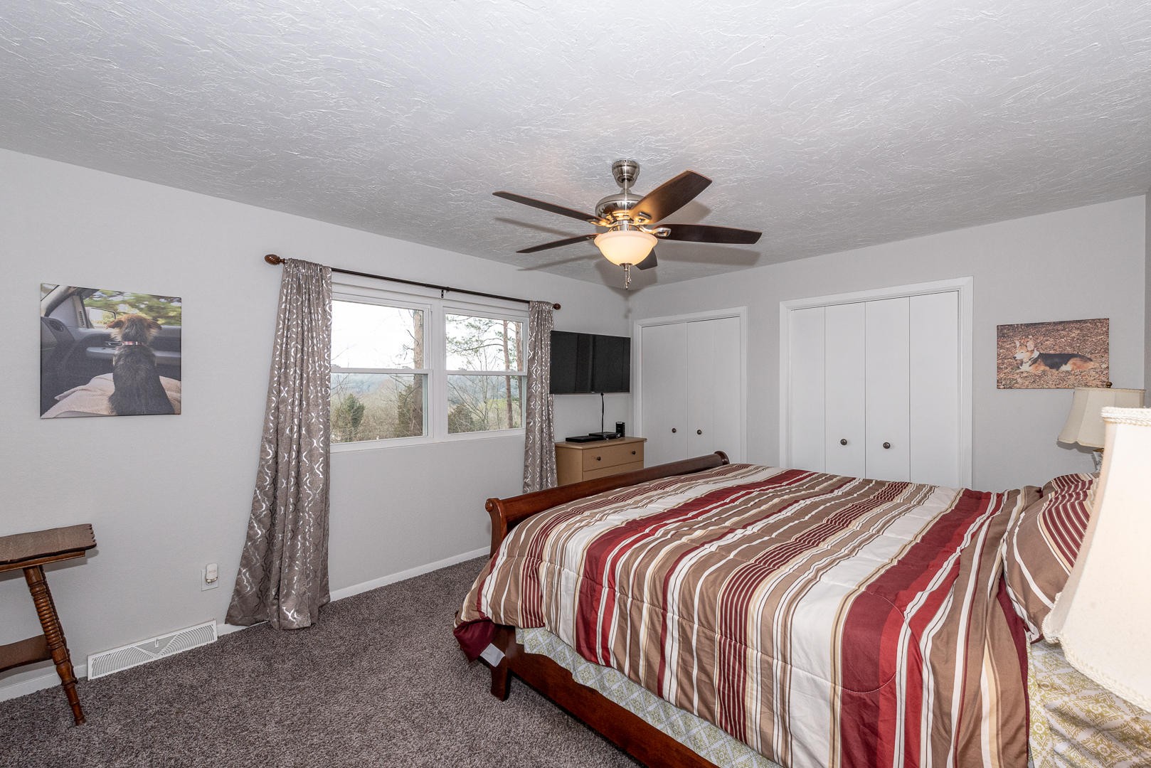 146 Cumberland View Drive Oak Ridge, TN 37830 - Photo 14 of 35 a bedroom with a large bed and a window