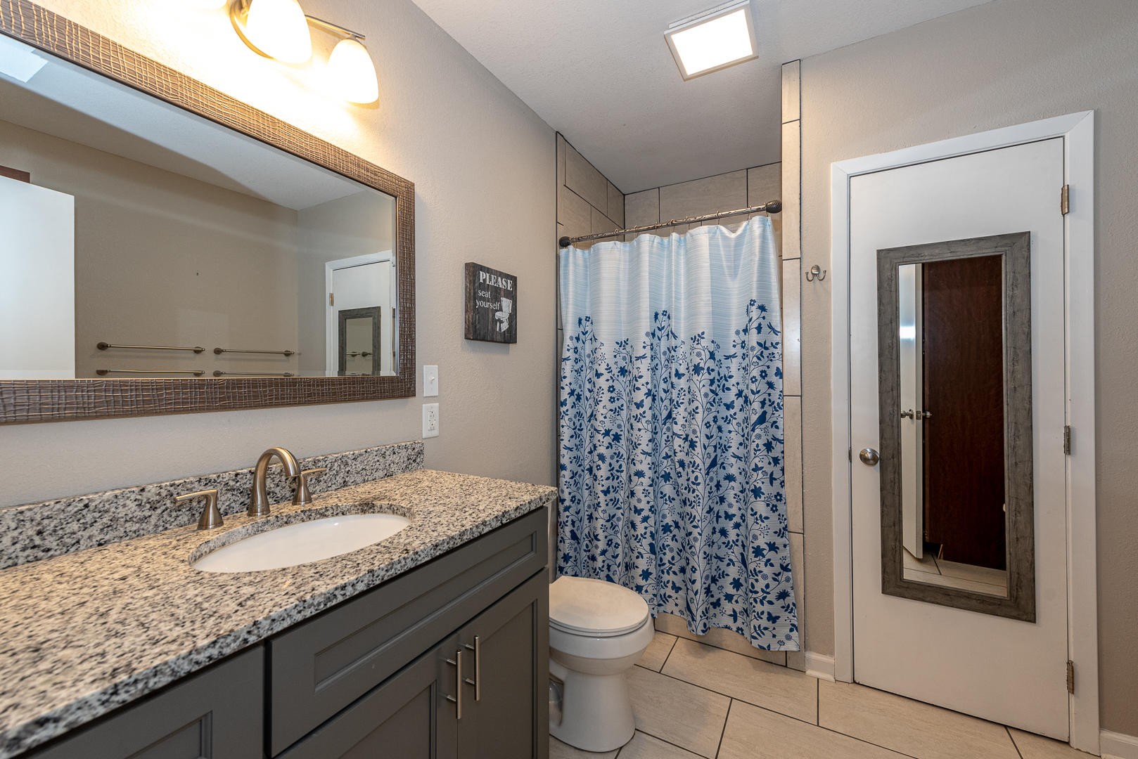 146 Cumberland View Drive Oak Ridge, TN 37830 - Photo 28 of 35 a bathroom with a granite countertop sink toilet and shower