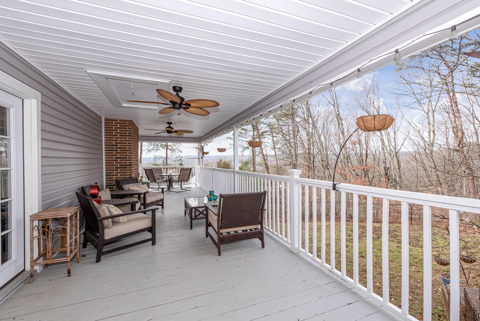 146 Cumberland View Drive Oak Ridge, TN 37830 - Photo 31 of 35 a living room with furniture and a wooden deck