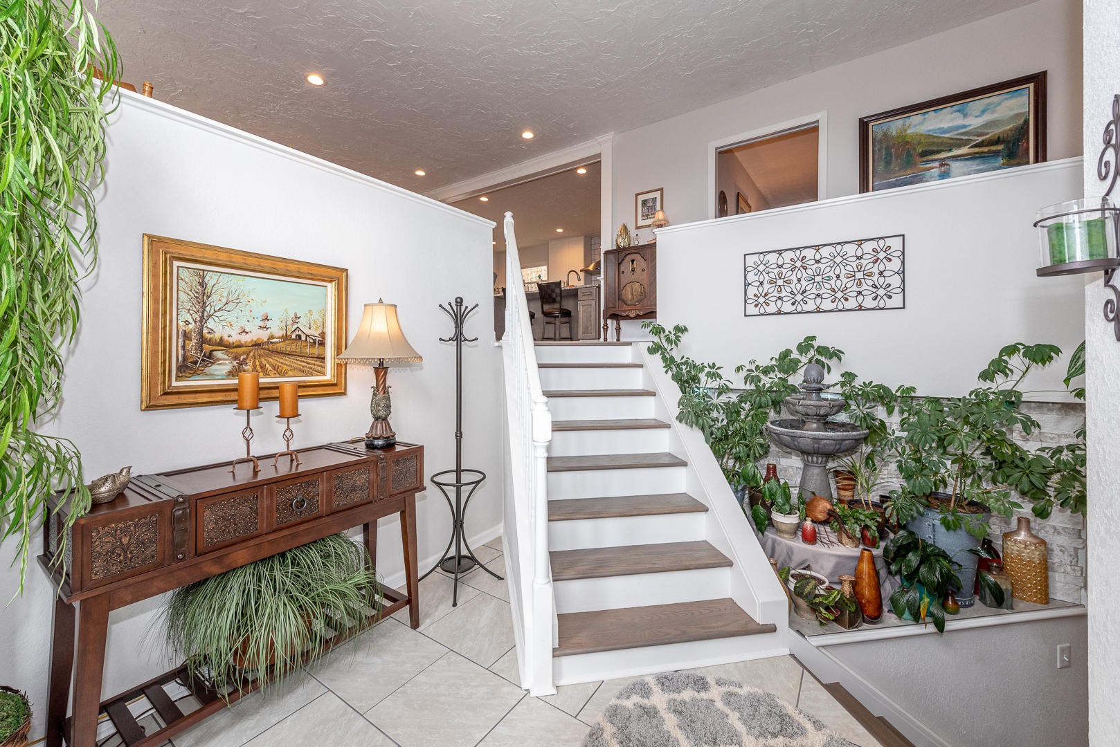 146 Cumberland View Drive Oak Ridge, TN 37830 - Photo 5 of 35 a view of a hallway with wooden floor and a potted plant