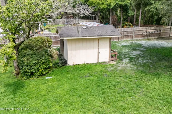 a view of a park with a slide