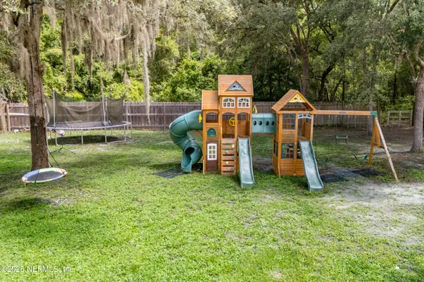 a view of an empty room with windows