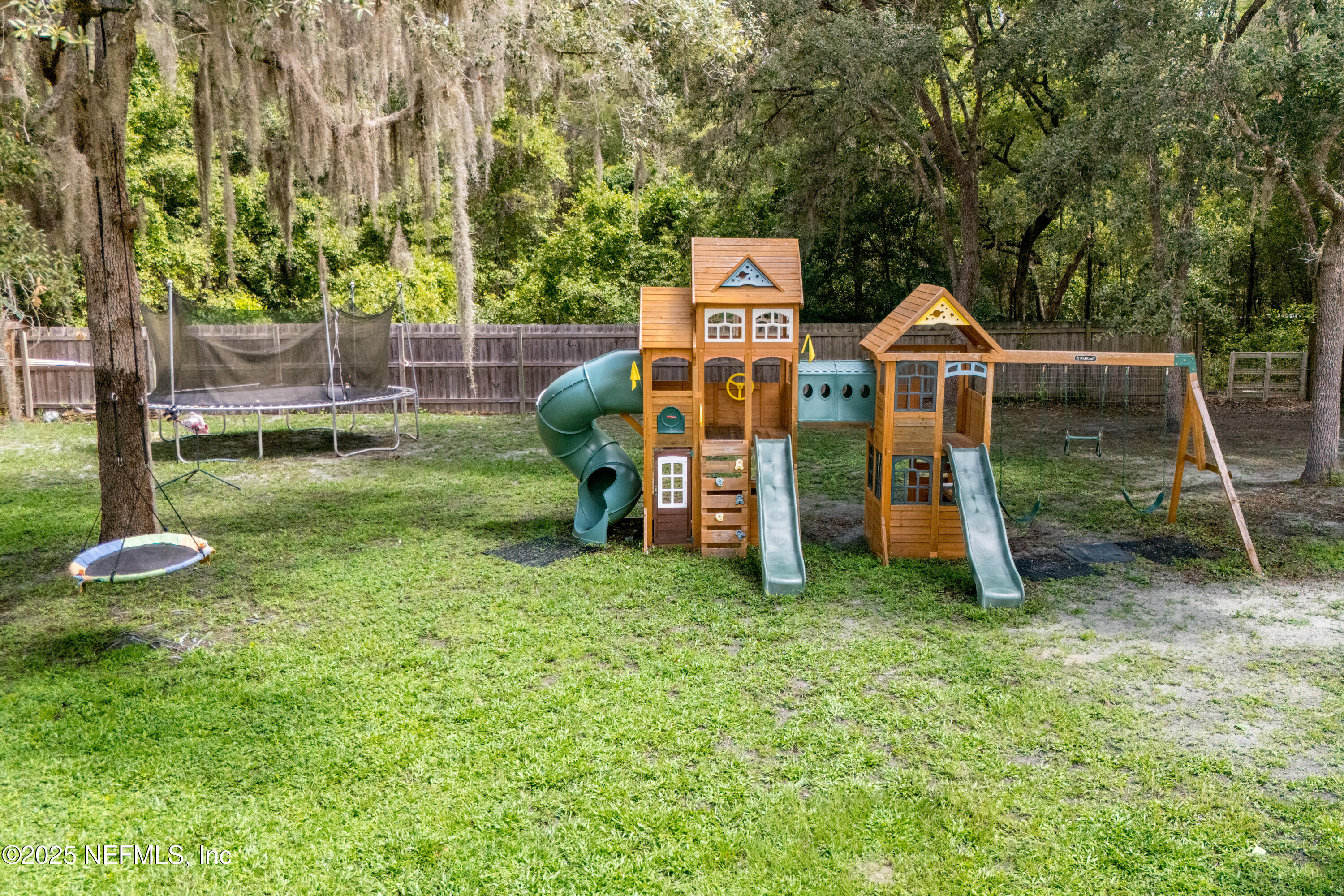 363 Southeast 73rd Street Starke, FL 32091 - Photo 16 of 49 a view of a park with two large trees