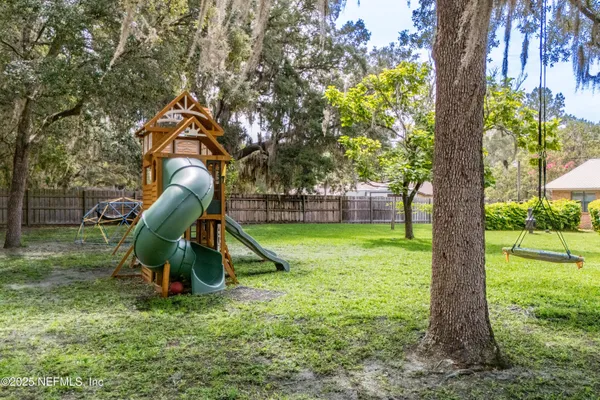 a view of lake with green space