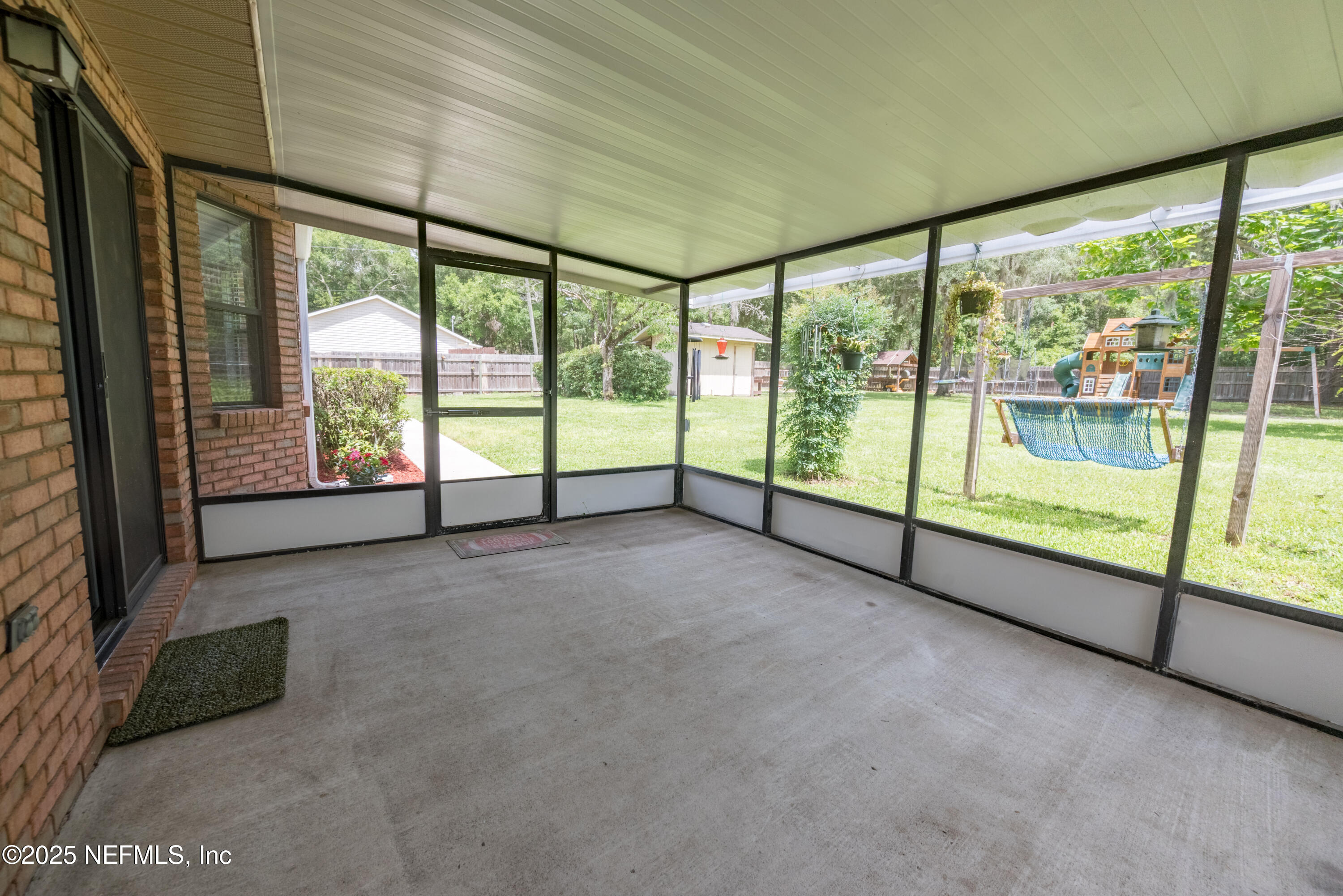 363 Southeast 73rd Street Starke, FL 32091 - Photo 22 of 49 a view of an empty room with large windows