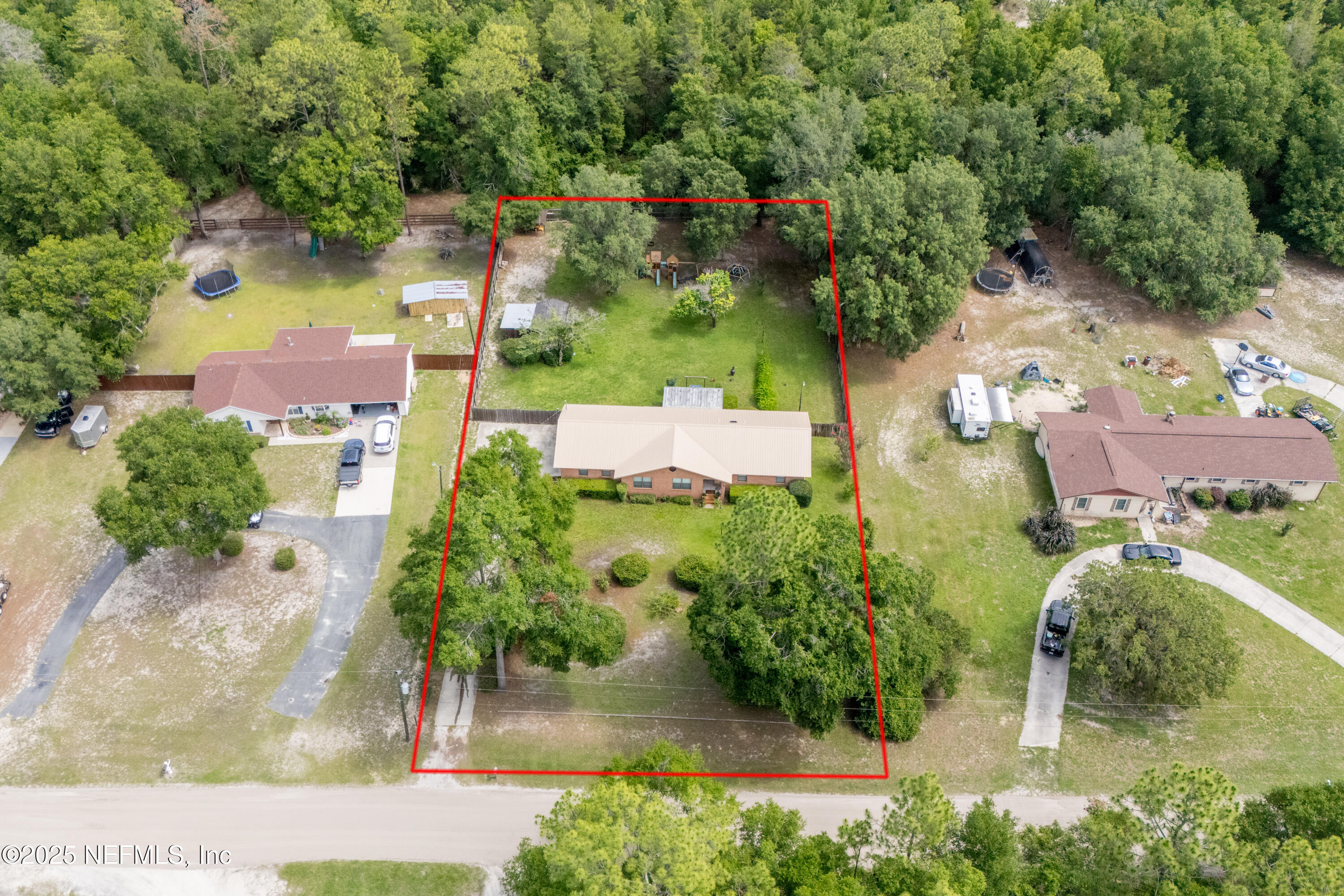 363 Southeast 73rd Street Starke, FL 32091 - Photo 23 of 49 an aerial view of residential houses with outdoor space