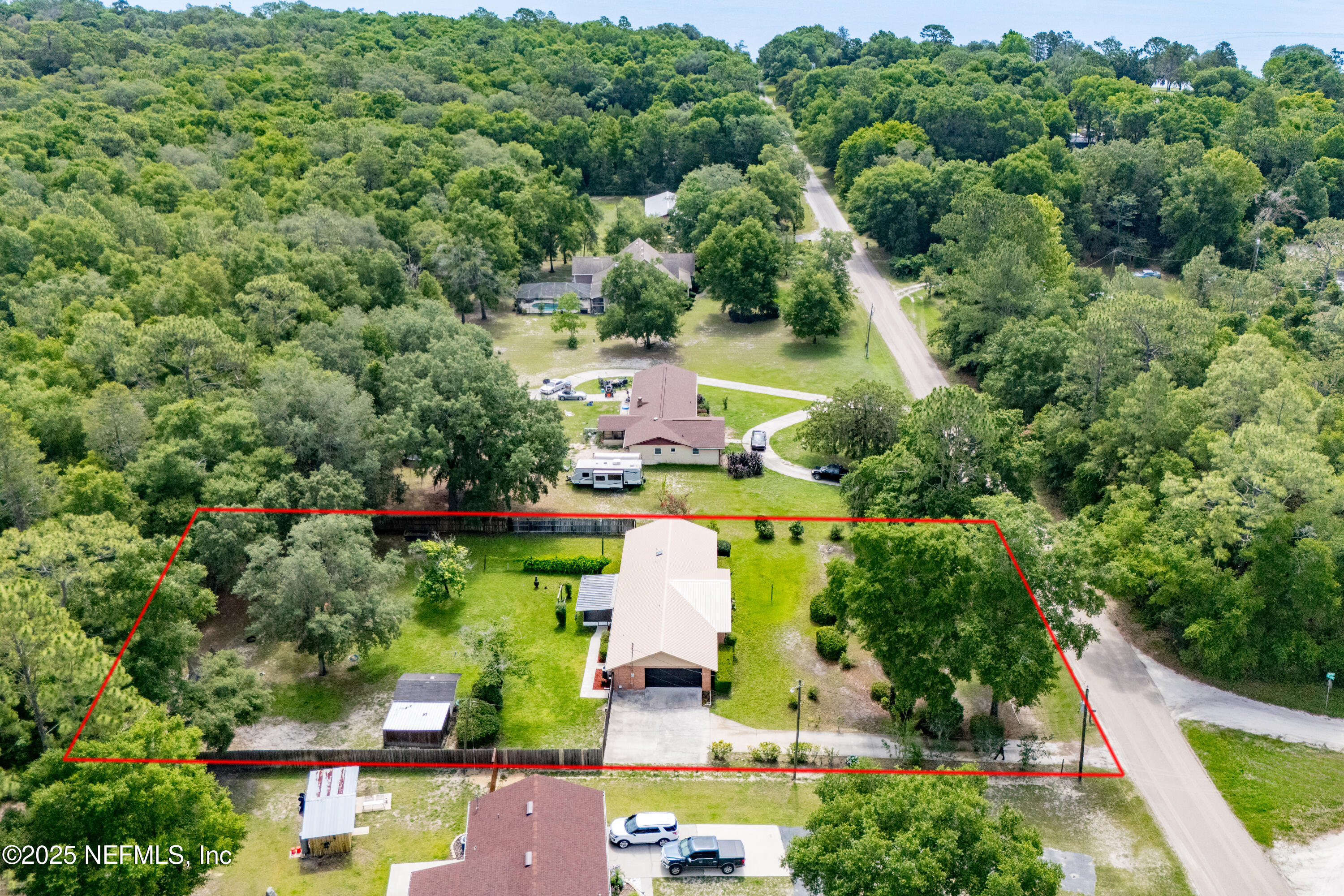 363 Southeast 73rd Street Starke, FL 32091 - Photo 28 of 49 an aerial view of residential houses with outdoor space and street view