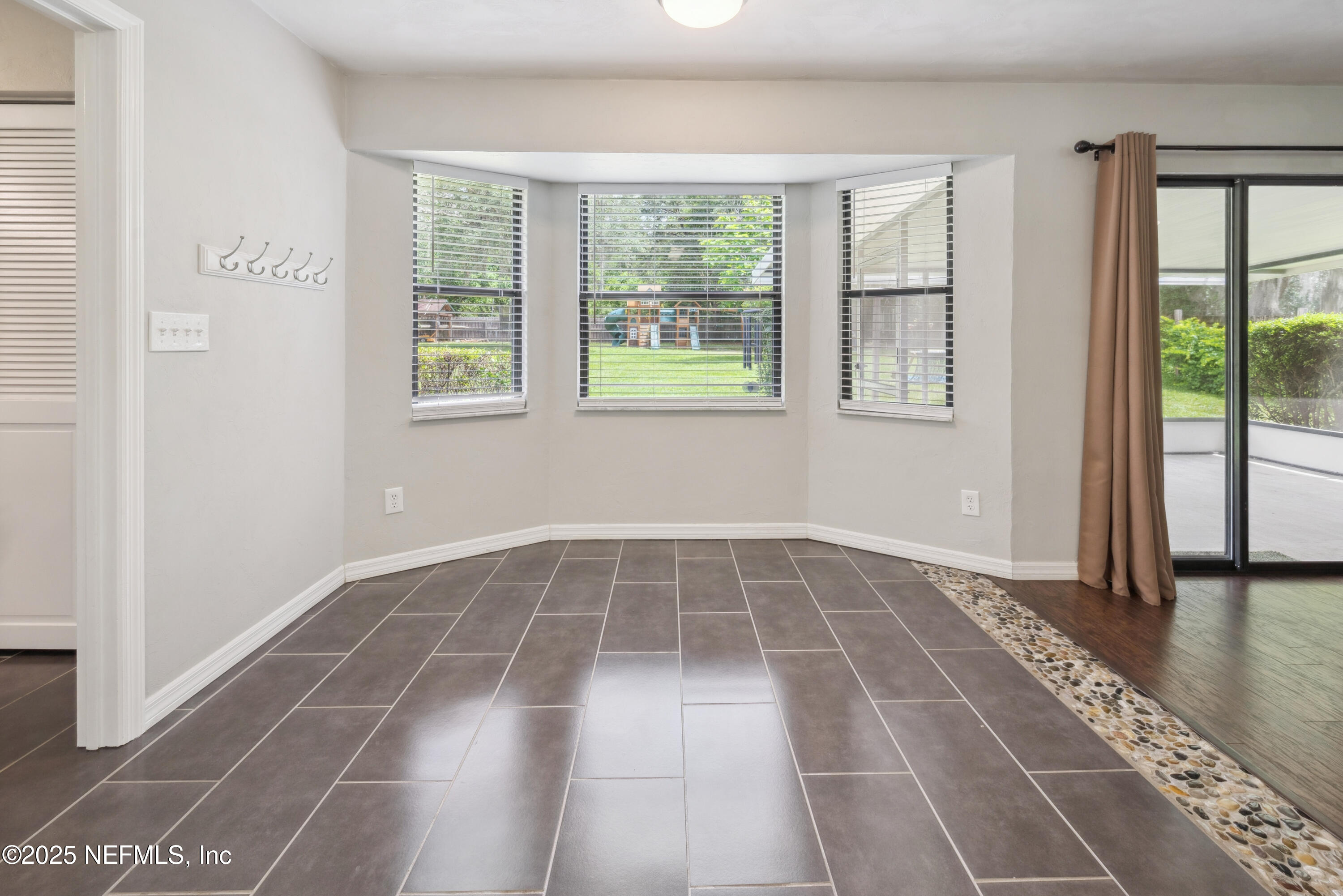 363 Southeast 73rd Street Starke, FL 32091 - Photo 40 of 49 a view of an empty room with glass door