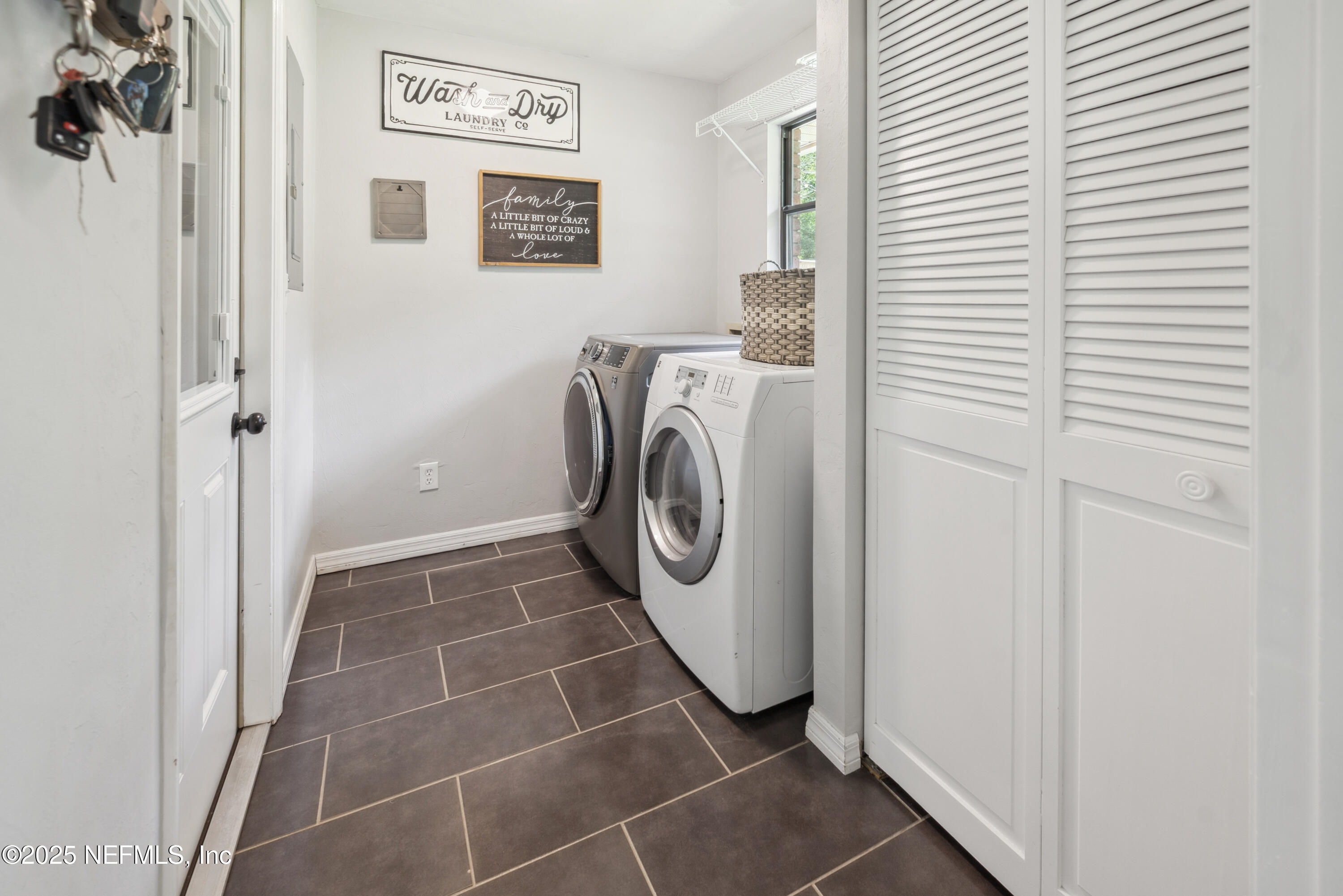 363 Southeast 73rd Street Starke, FL 32091 - Photo 41 of 49 a utility room with dryer and washer