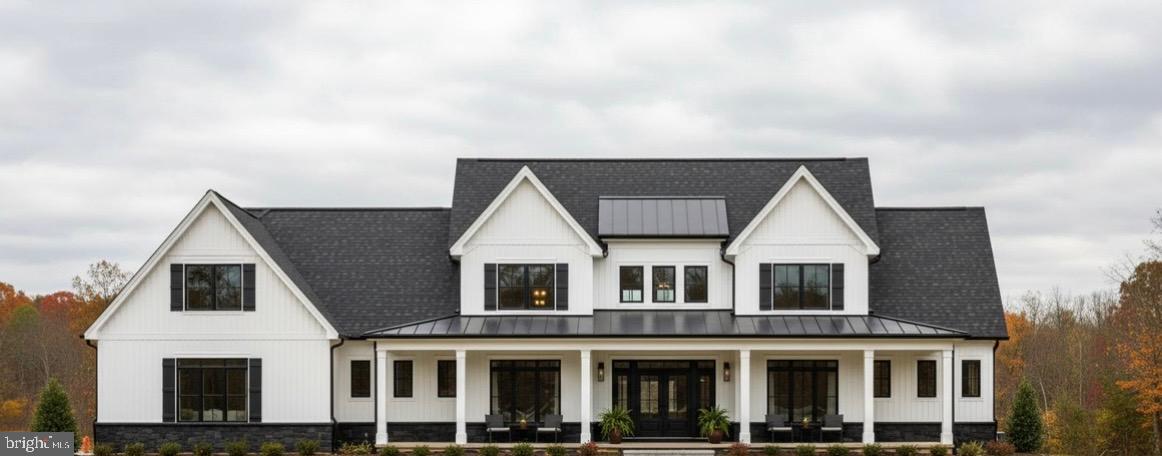 a view of house with a yard