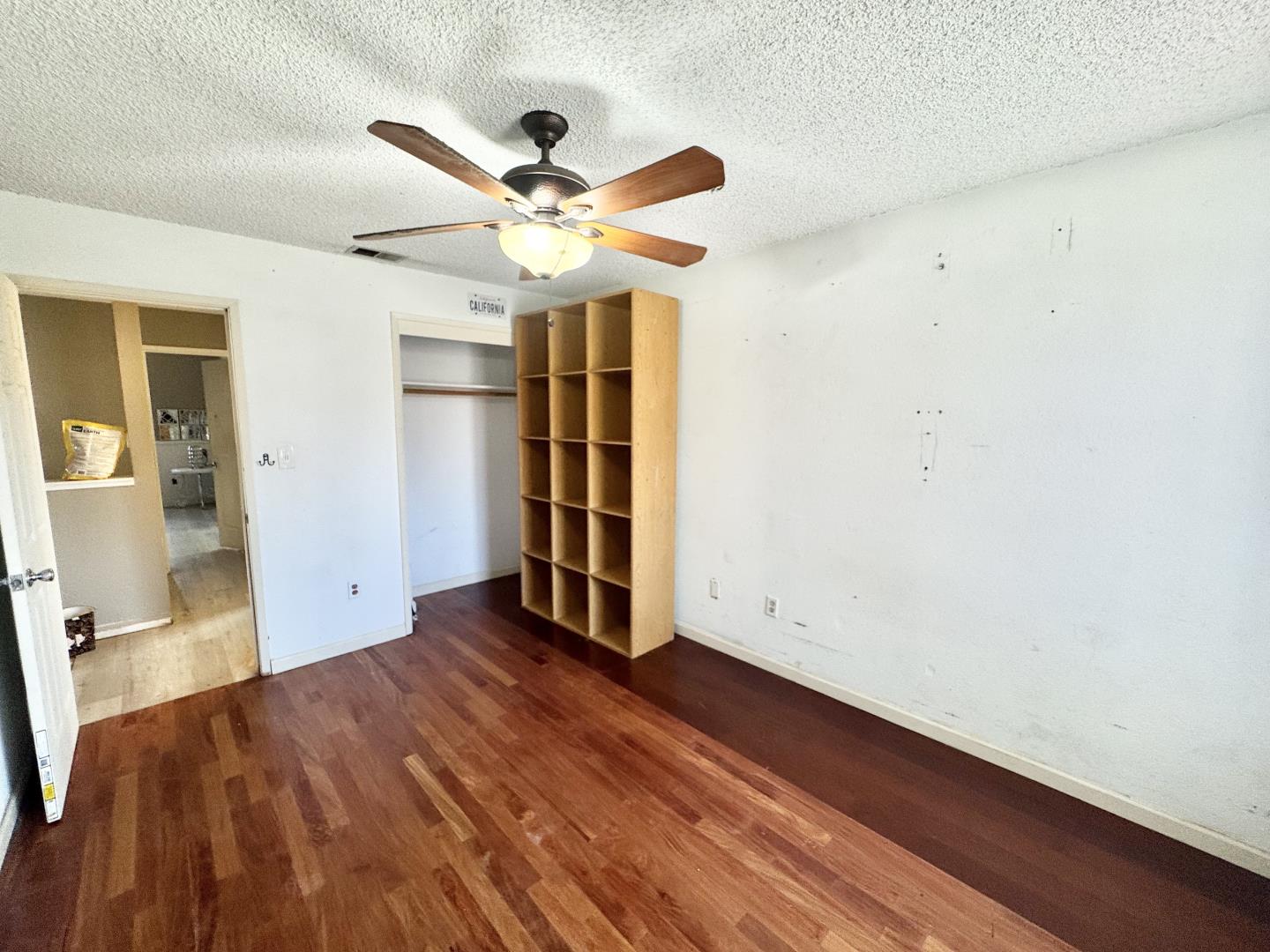 7605 Golden Rise Court Bakersfield, CA 93313 - Photo 11 of 16 wooden floor in an empty room