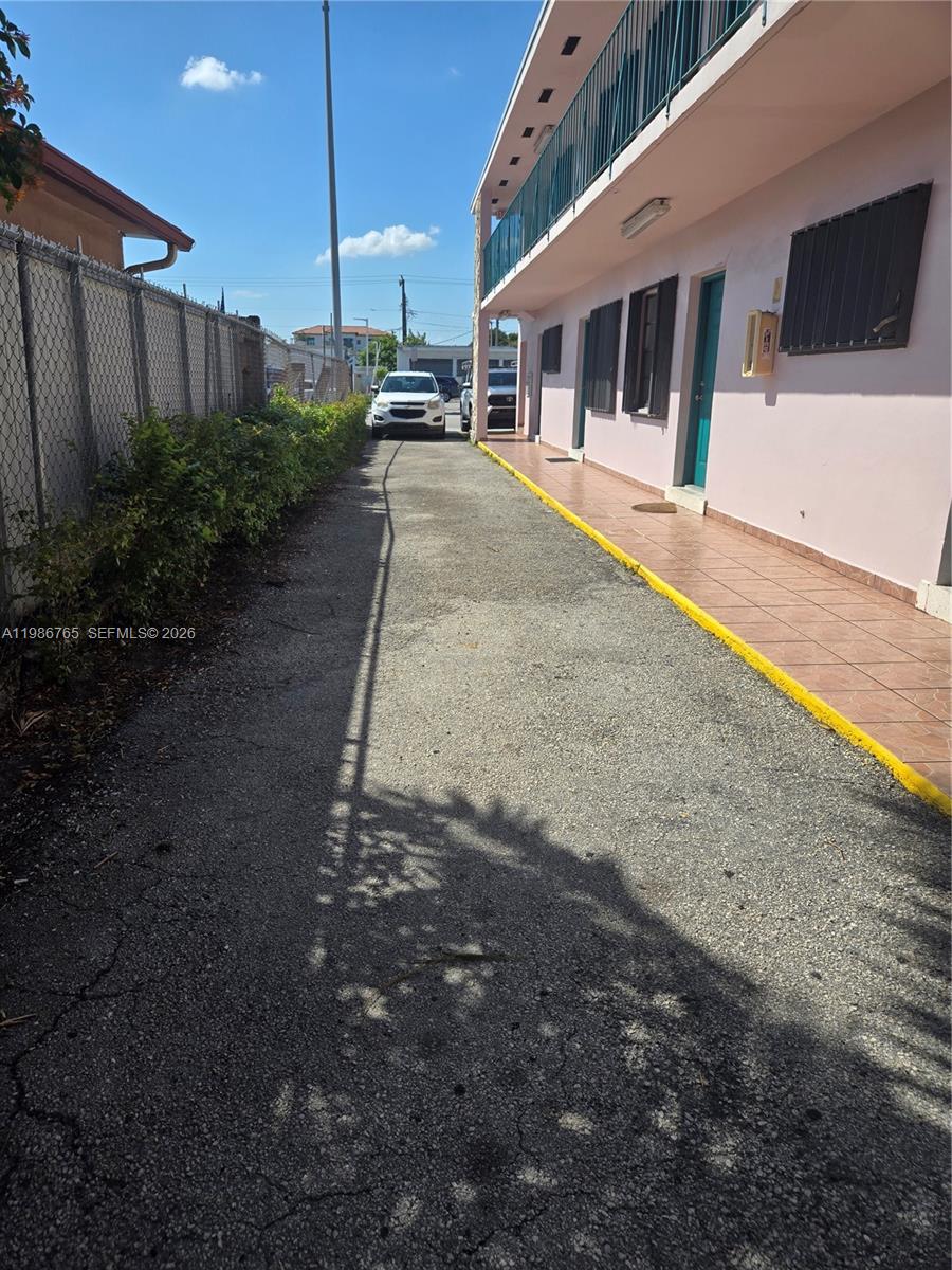 15 West 9th Street, Unit 3 Hialeah, FL 33010 - Photo 2 of 9 a view of a house with a backyard