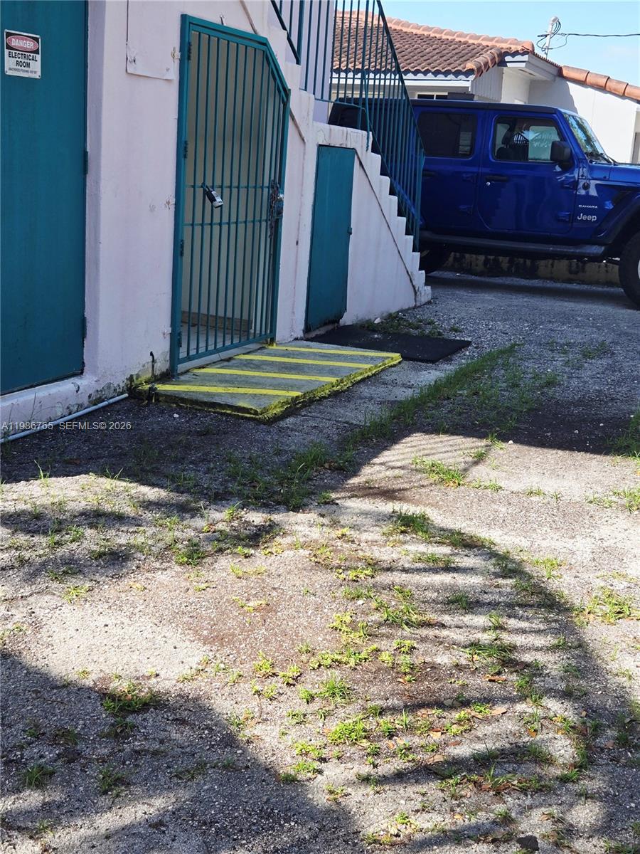 15 West 9th Street, Unit 3 Hialeah, FL 33010 - Photo 4 of 9 a view of a backyard of the house