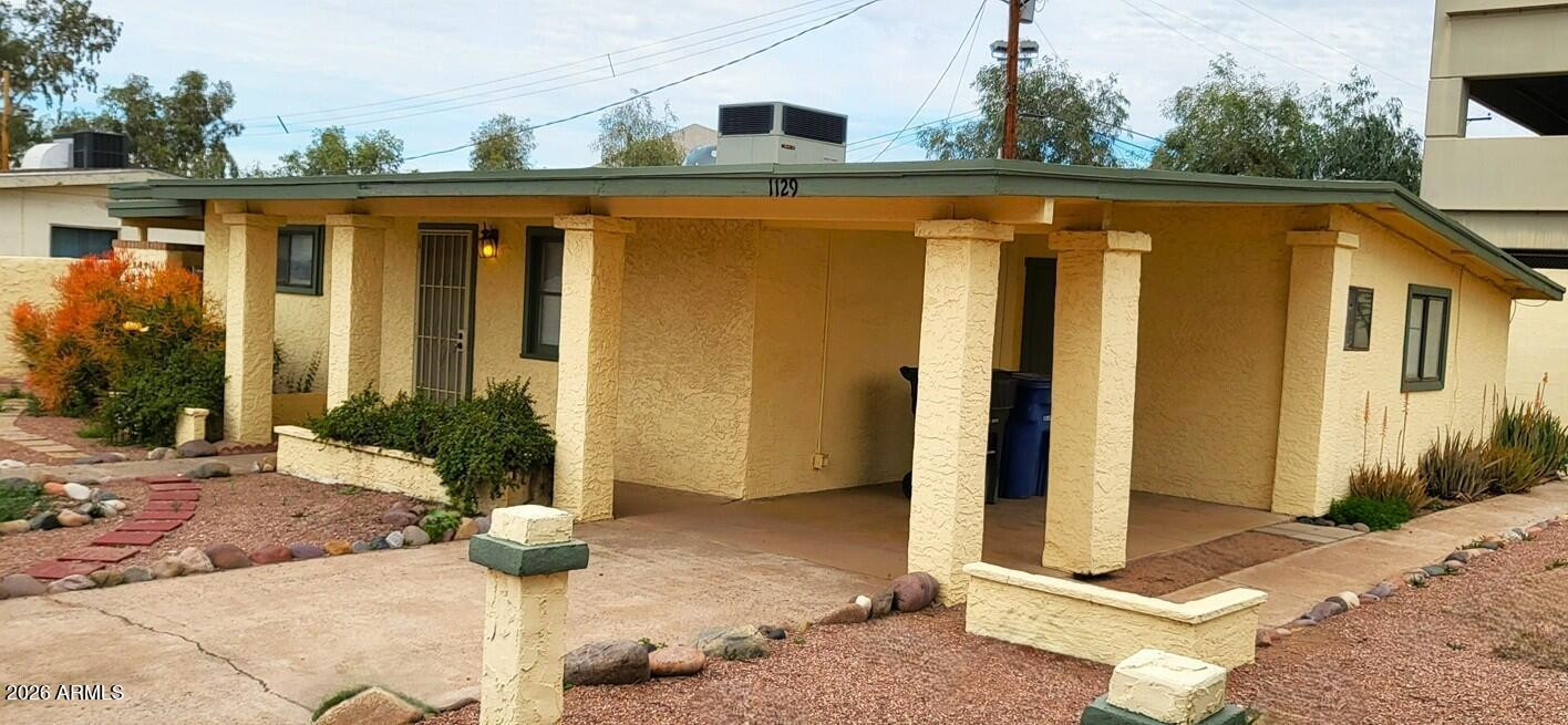 1125 South Stratton Lane Tempe, AZ 85281 - Photo 1 of 10 a view of a house with backyard