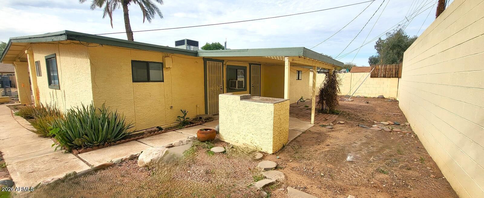 1125 South Stratton Lane Tempe, AZ 85281 - Photo 10 of 10 a front view of a house with a yard