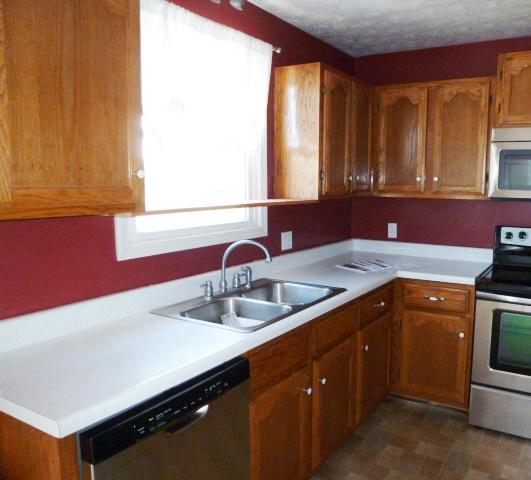 2116 Lock B Road North Clarksville, TN 37043 - Photo 6 of 20 Kitchen View #2- Recent Stainless Steel Appliances to include Smooth top range/oven, Built in Microwave, and Dishwasher. Great view from your kitchen window too!