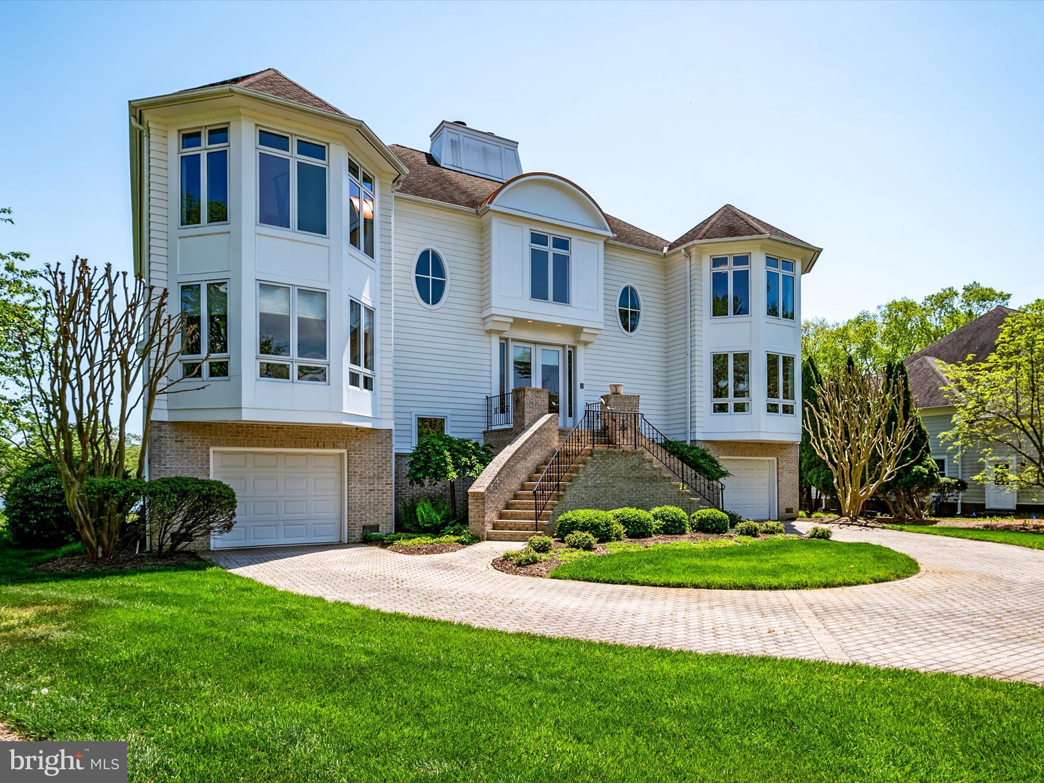 1237 Cherry Tree Lane Annapolis, MD 21403 - Photo 2 of 86 a front view of a house with a yard and garage