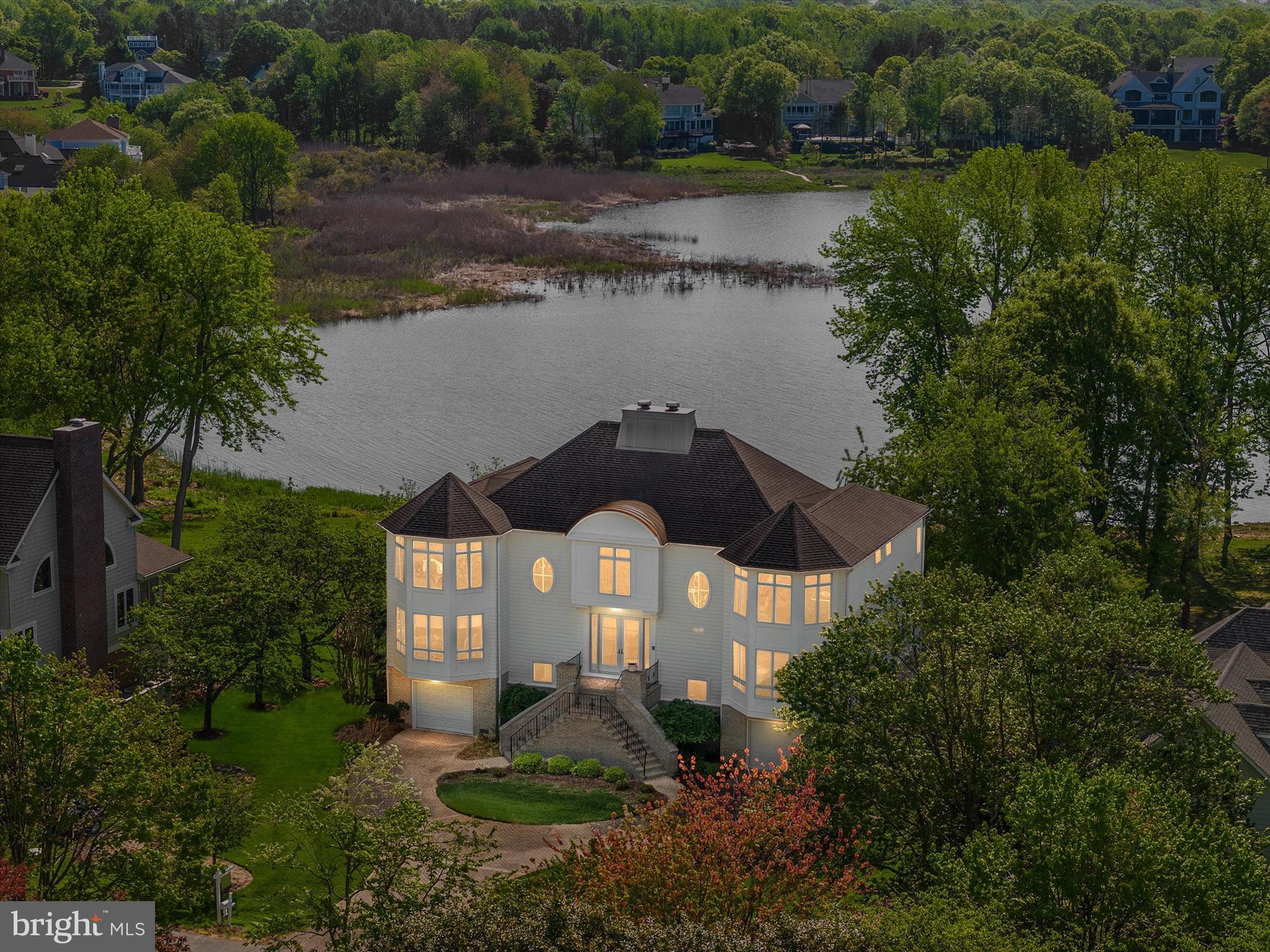 1237 Cherry Tree Lane Annapolis, MD 21403 - Photo 3 of 86 a front view of a house with a yard and lake view