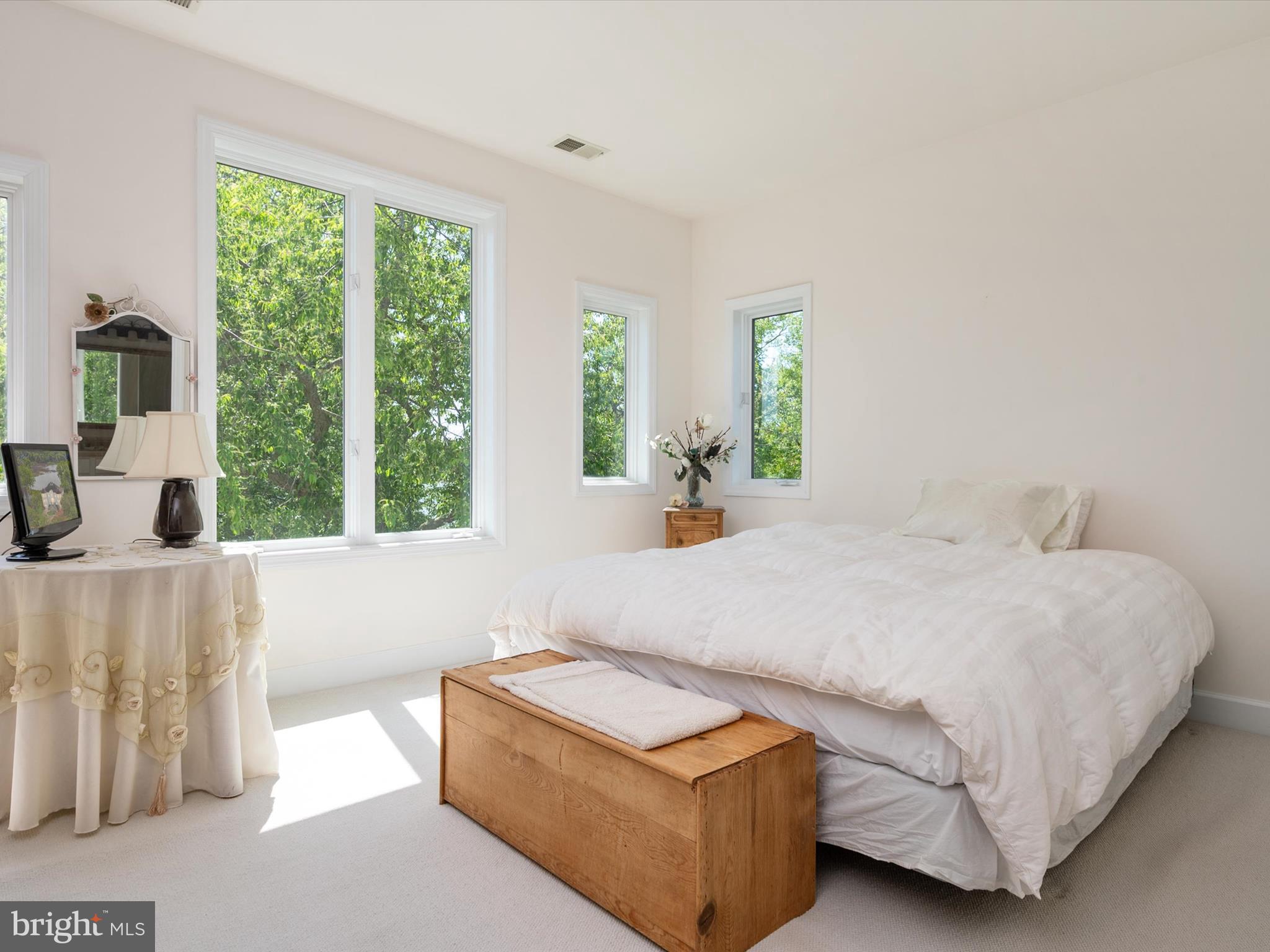 1237 Cherry Tree Lane Annapolis, MD 21403 - Photo 45 of 86 a bedroom with a bed and a large window