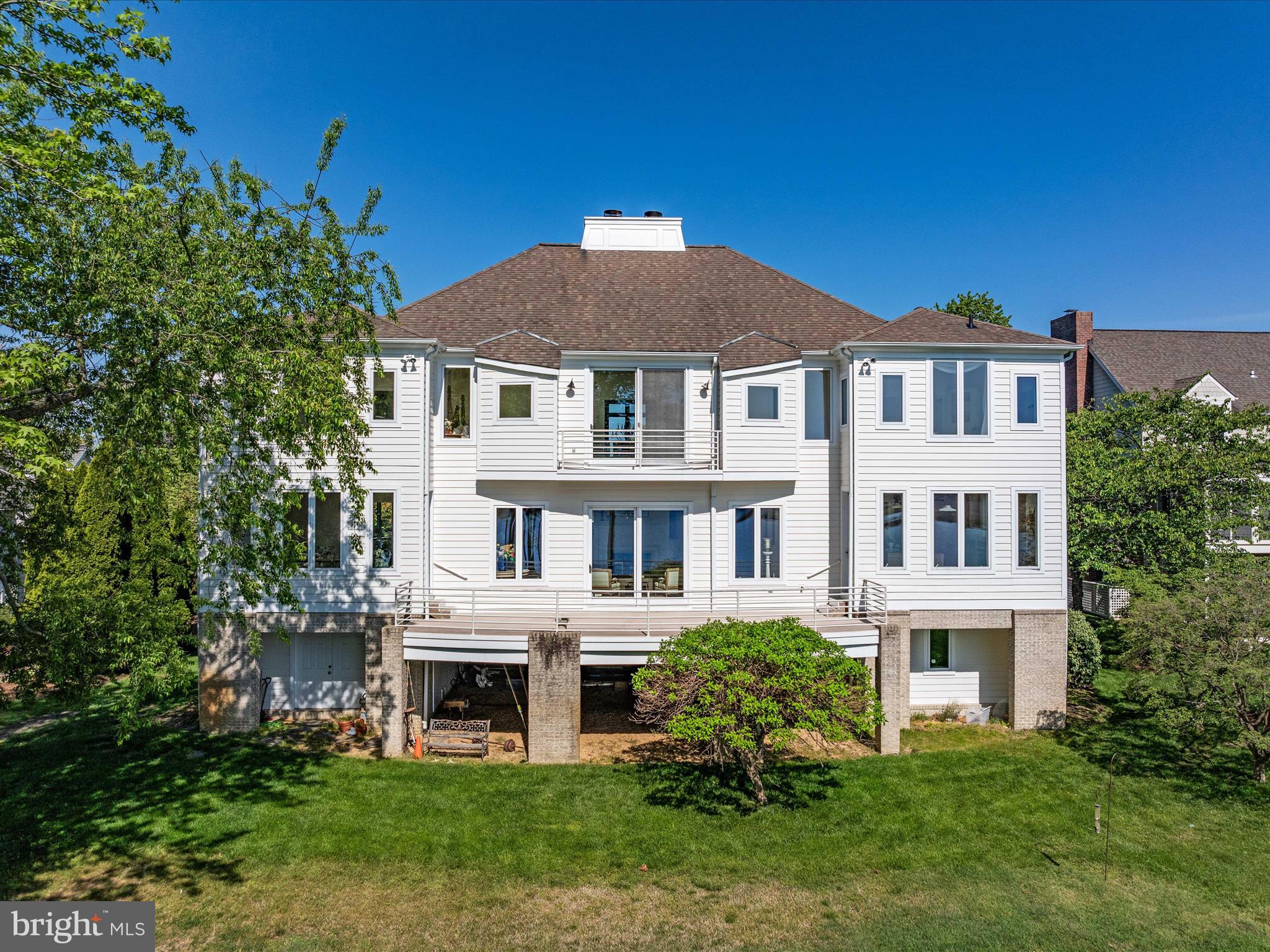 1237 Cherry Tree Lane Annapolis, MD 21403 - Photo 54 of 86 a front view of a house with a yard