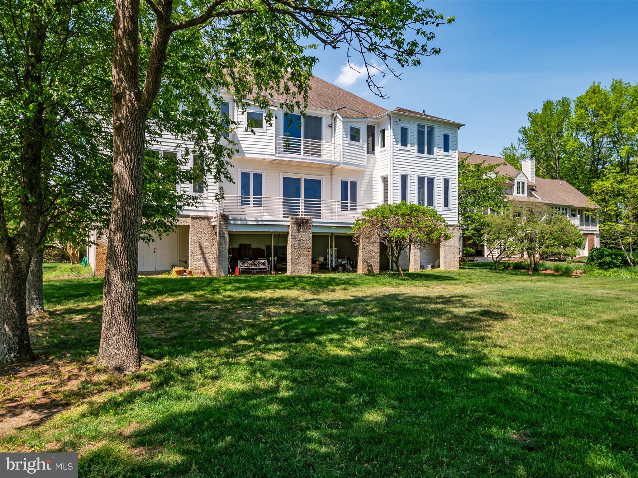 1237 Cherry Tree Lane Annapolis, MD 21403 - Photo 56 of 86 a front view of a house with a garden