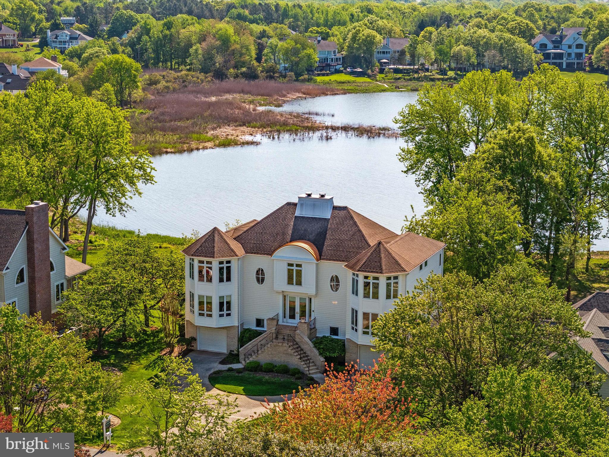 1237 Cherry Tree Lane Annapolis, MD 21403 - Photo 68 of 86 an aerial view of a house with a garden and lake view