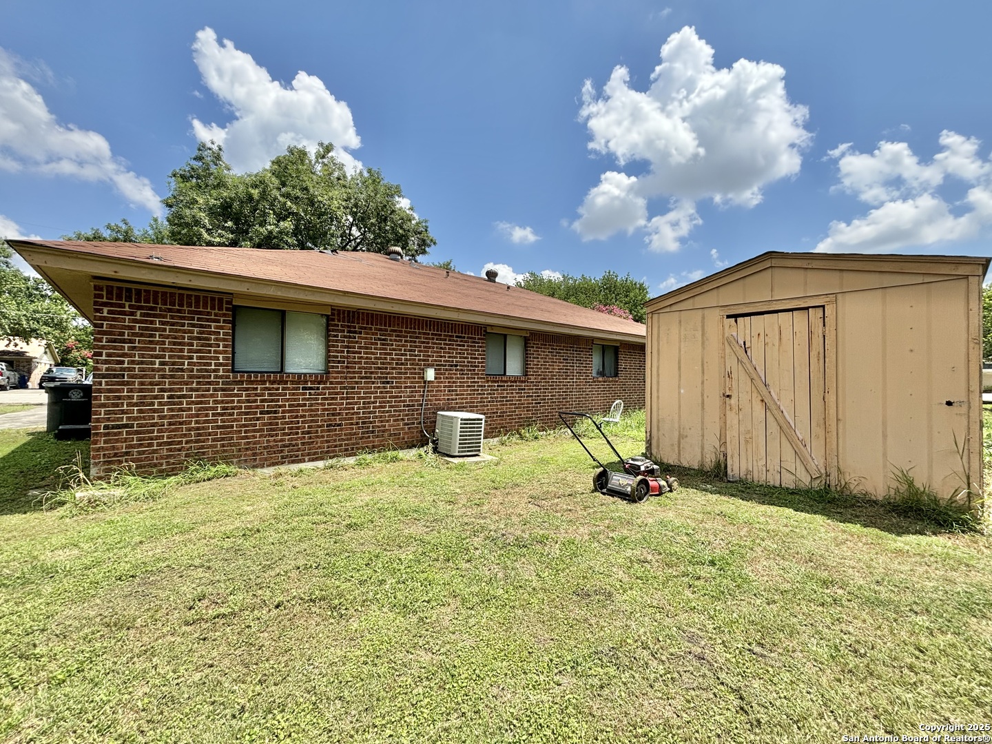 207 Redbud Lane, Unit B New Braunfels, TX 78130 - Photo 10 of 11 a view of backyard with a garden and entertaining space