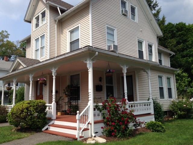49 South Main Street, Unit B New Milford, CT 06776 - Photo 1 of 1 front view of a house with a yard