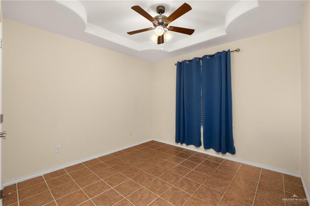 4716 Xanthisma Avenue McAllen, TX 78504 - Photo 12 of 17 an empty room with closet and fan