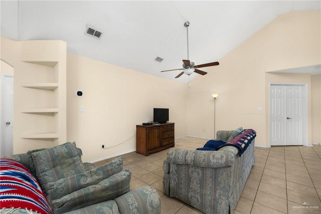 4716 Xanthisma Avenue McAllen, TX 78504 - Photo 3 of 17 a living room with furniture and a flat screen tv