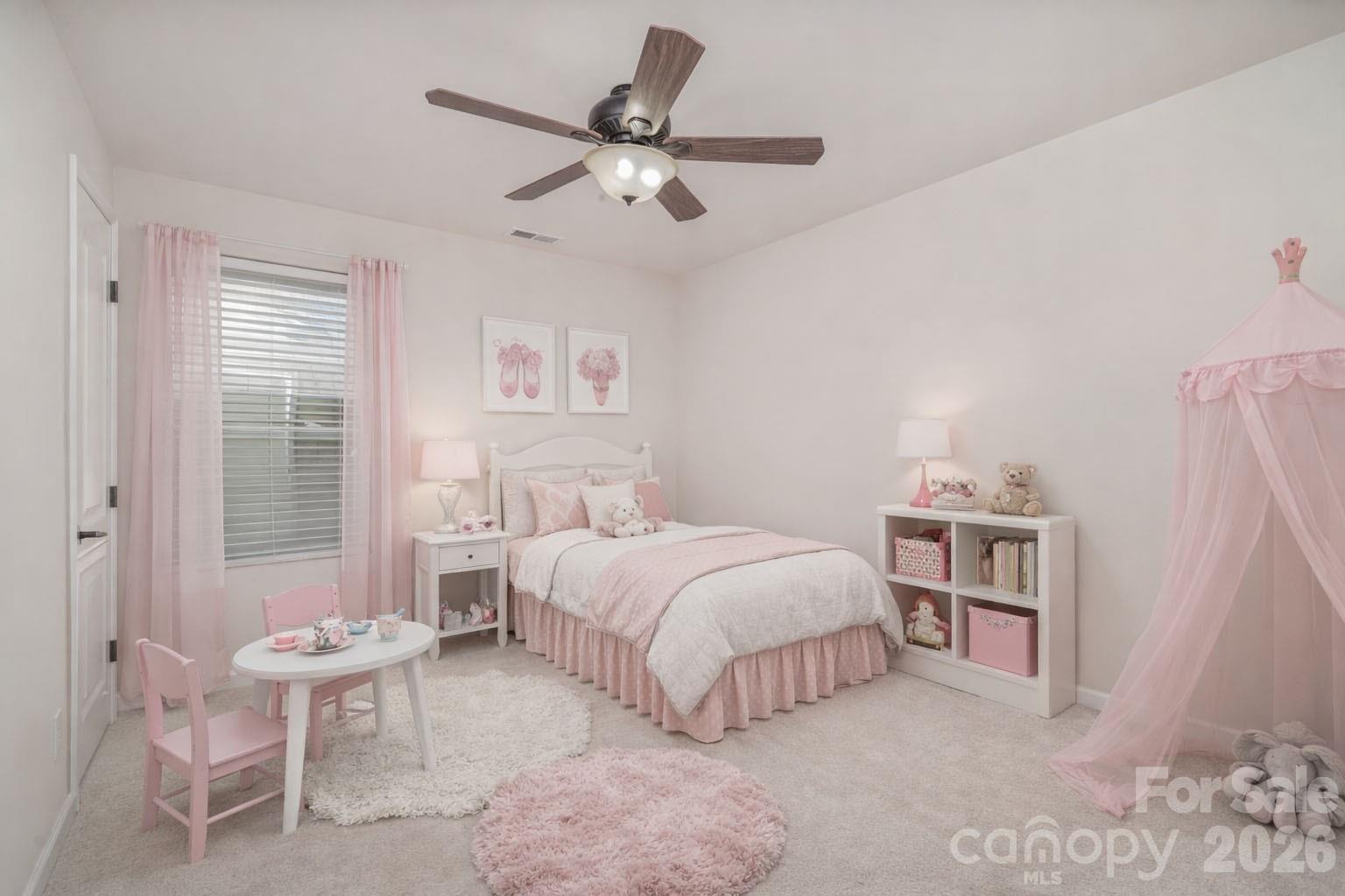 1528 Spring Blossom Trail Fort Mill, SC 29708 - Photo 21 of 31 a bedroom with a bed and a large window